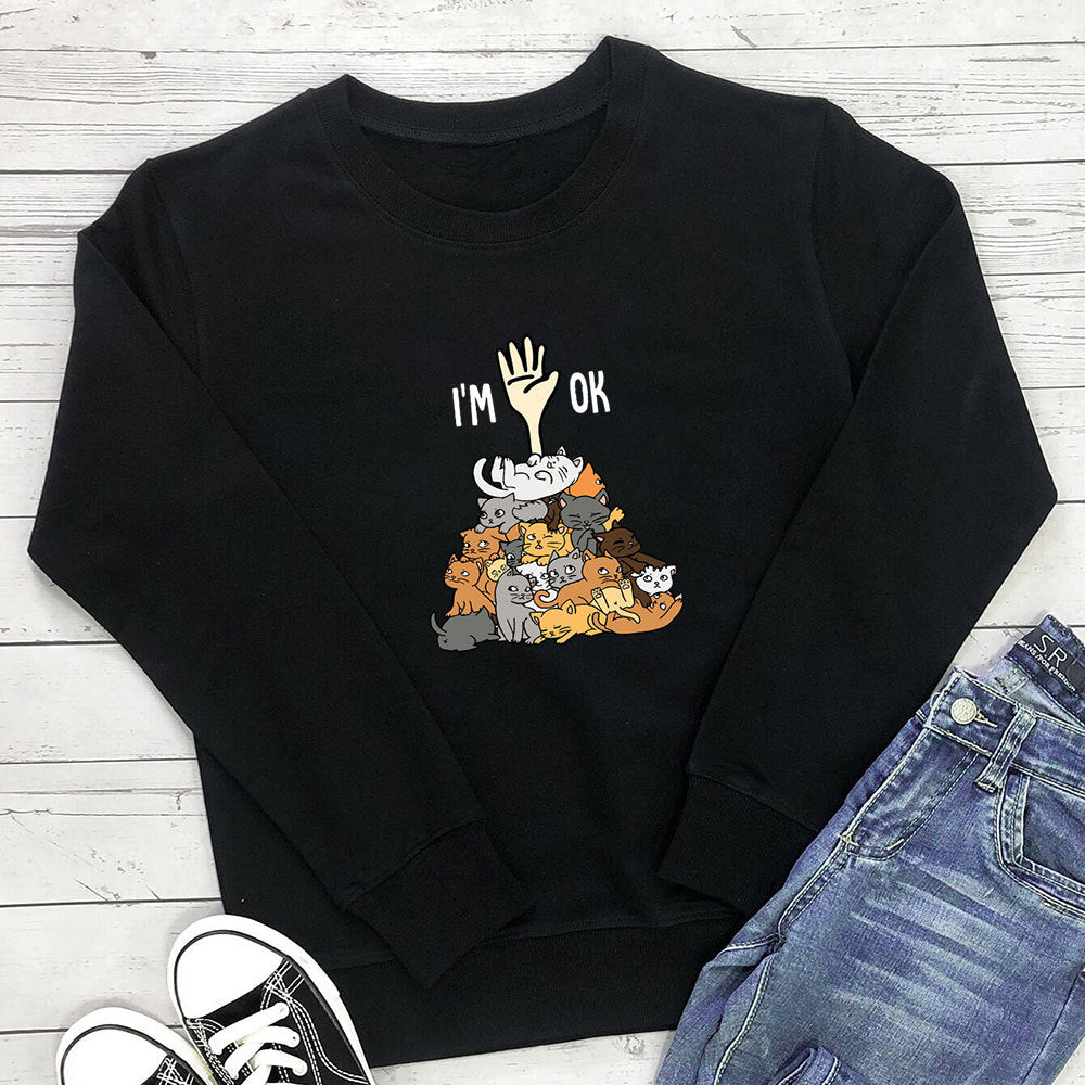 A pile of cat letter printed hoodies